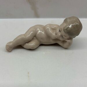 NAO by Lladro Porcelain Figurine Baby Boy Reclining Naked Thinking